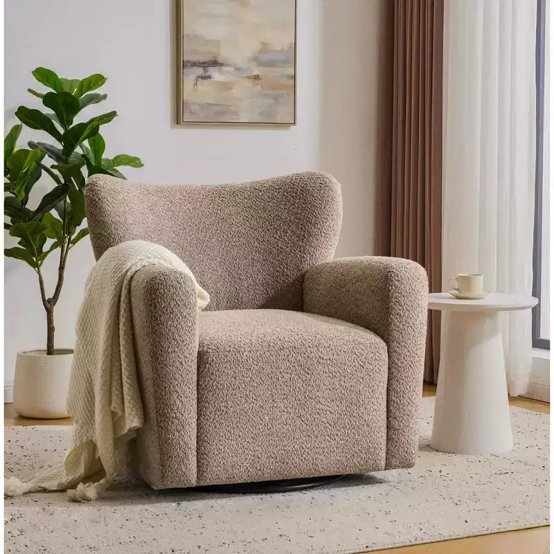 Fauteuil cabriolet pivotant 360°, dossier haut, garni de bouclettes, piètement en fer moderne